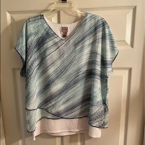 Chico’s Easywear Top.  Size: 2. Length: 25”.  Brand New Condition.  Never Worn.